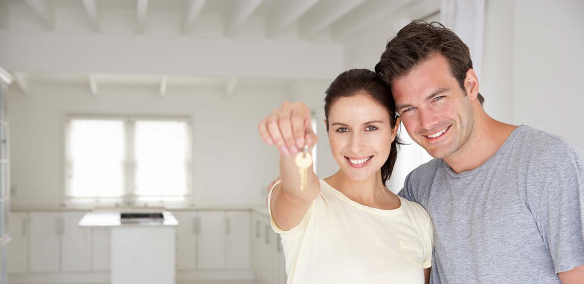 Couple with new house keys